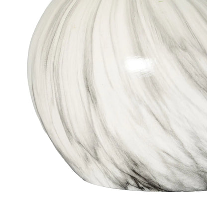 Close-up of a marble-patterned surface with gray and white colors.