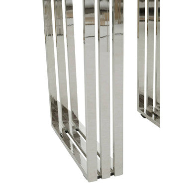 Metallic cylindrical object with vertical bars on a white background