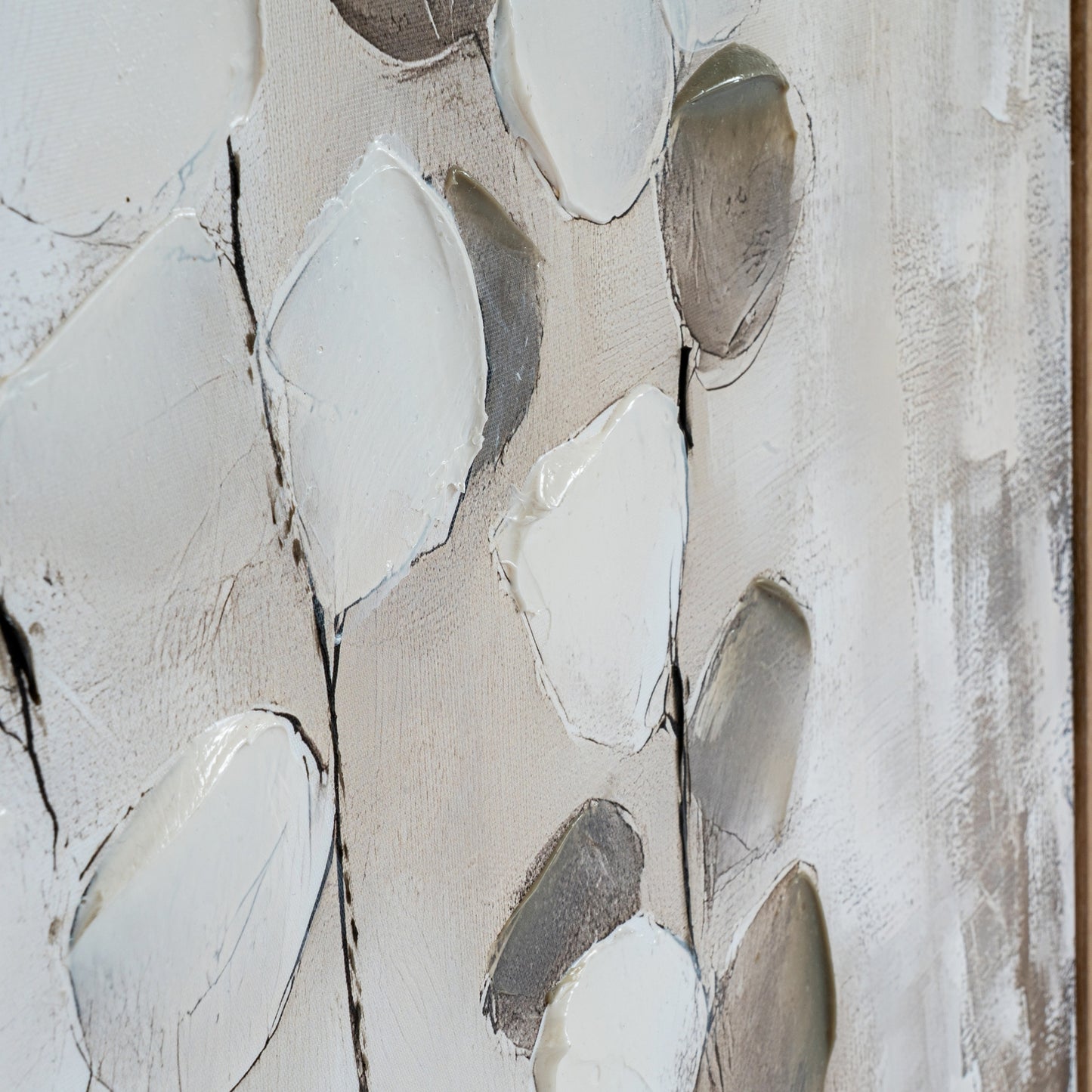 Abstract art piece with geometric shapes in neutral colors on a textured background