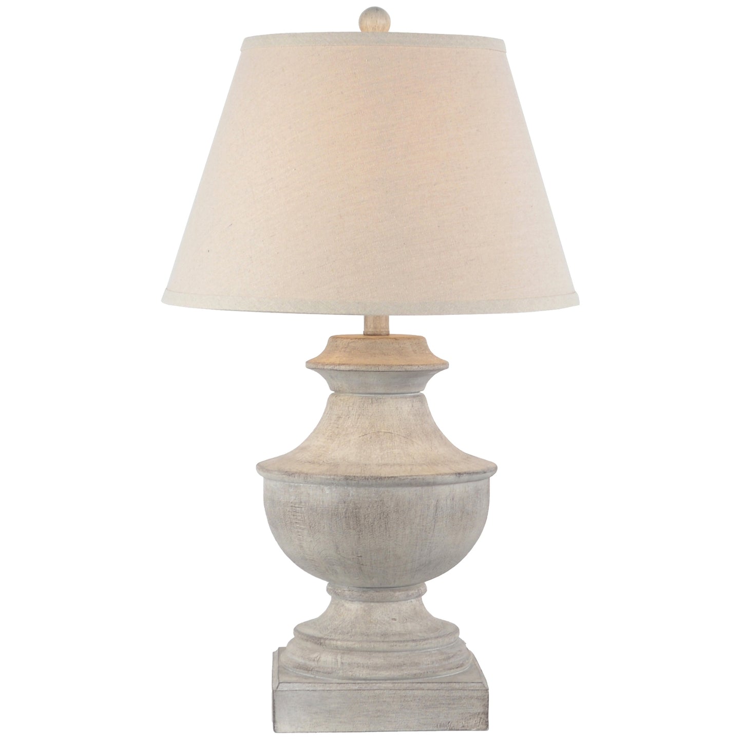Table lamp with a beige shade and textured base on a white background