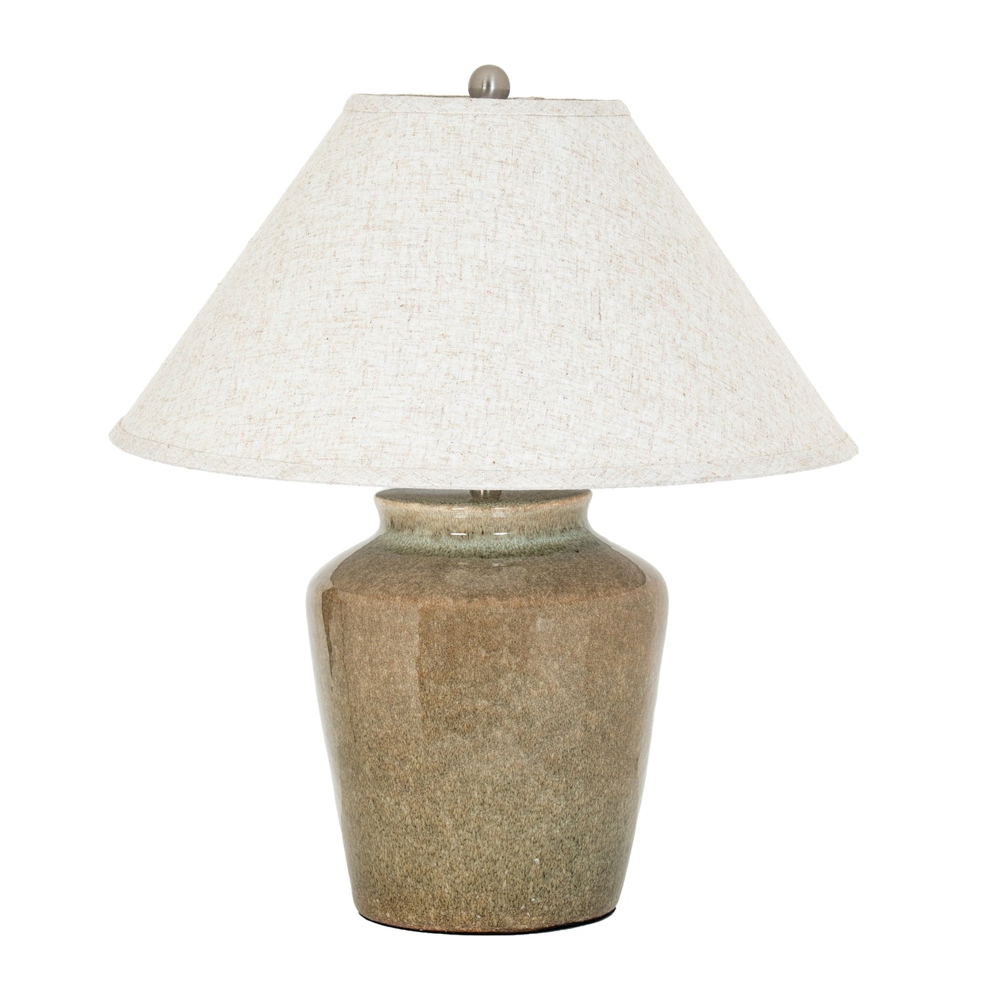 Table lamp with a textured ceramic base and white lampshade on a white background