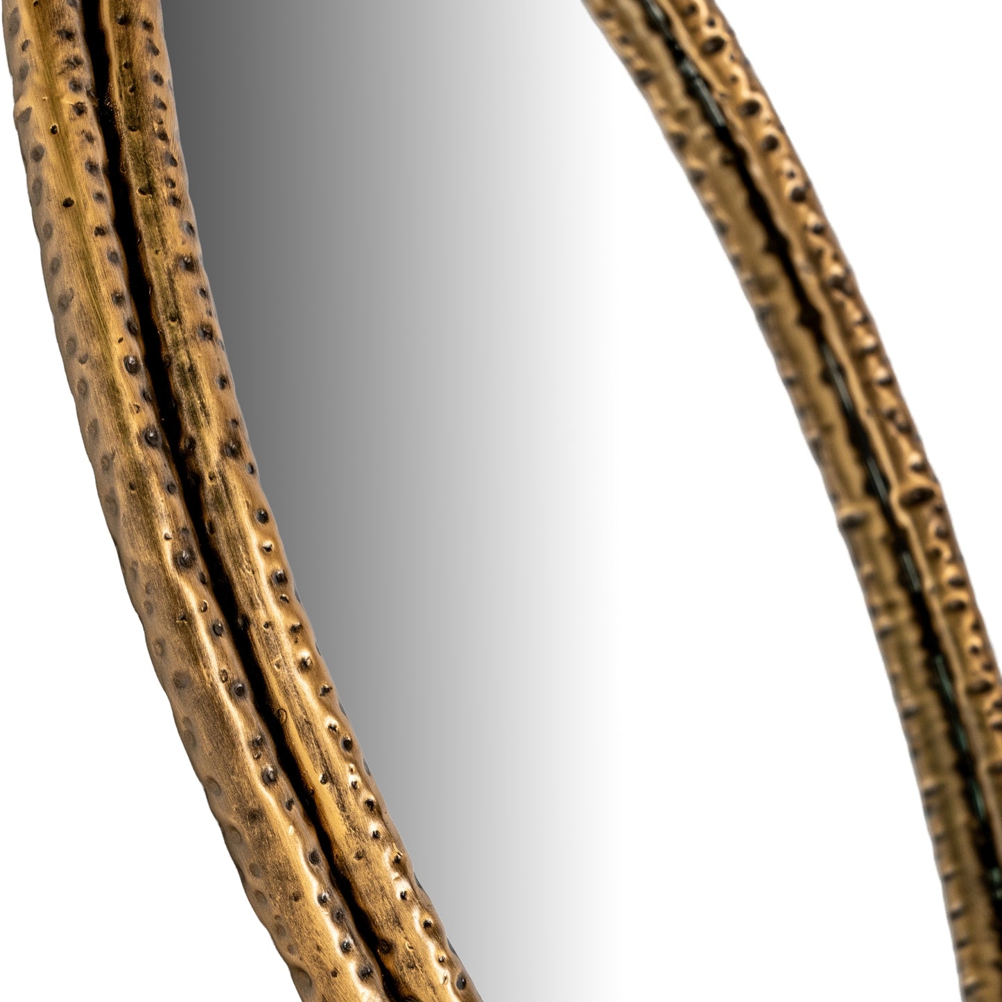 Close-up of a decorative mirror with a textured gold frame on a white background