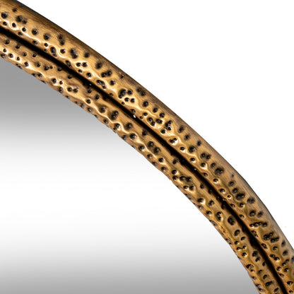 Close-up of a textured bronze mirror frame on a white background