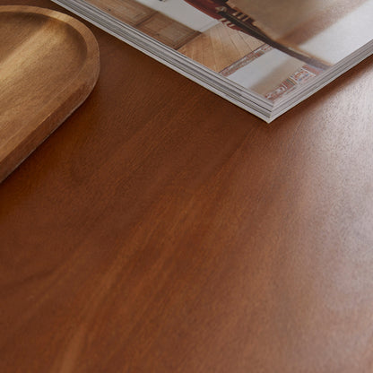 Wooden surface with a magazine and wooden tray