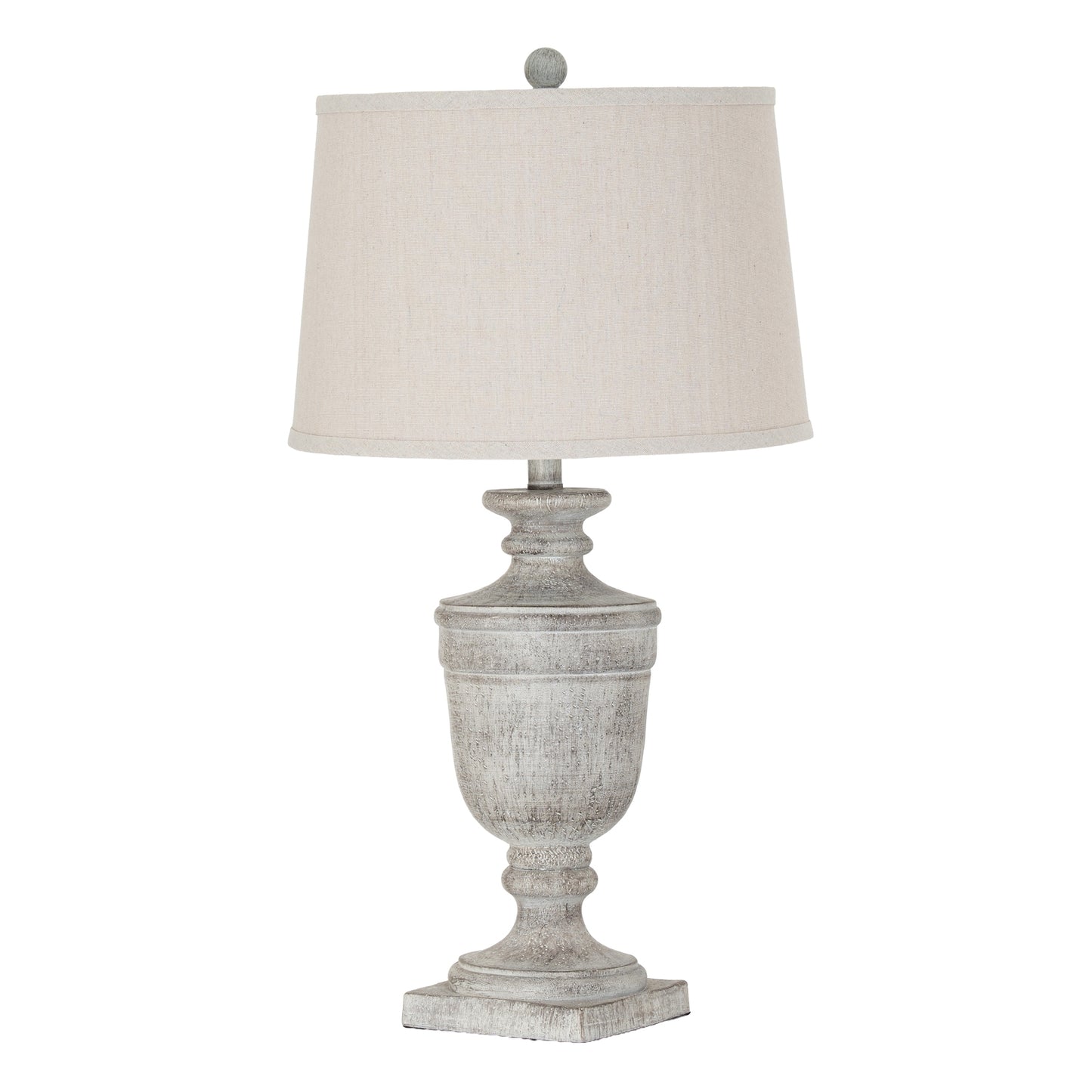 Table lamp with a textured gray base and a white lampshade on a white background