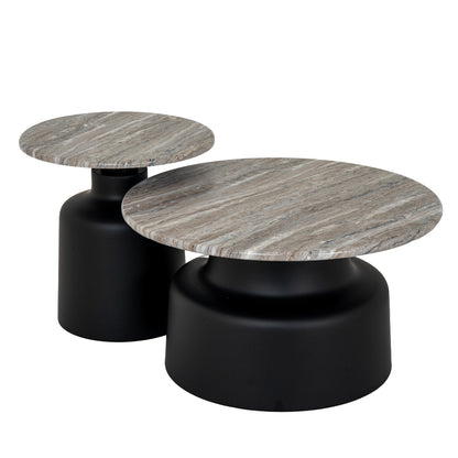 Two round coffee tables with marble top and black cylindrical base on a white background