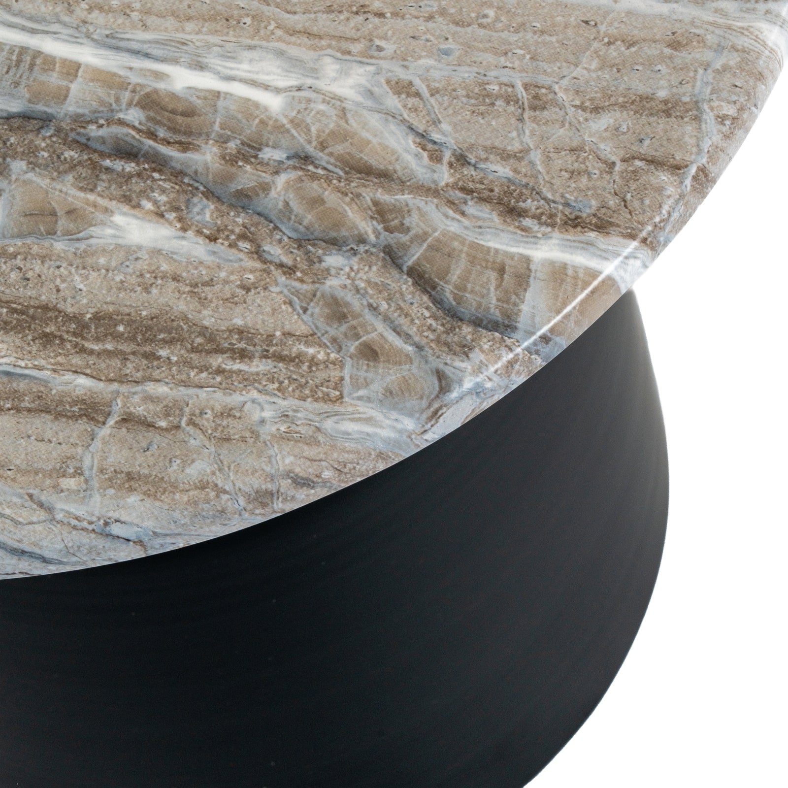 Close-up of a marble table with a black base on a white background