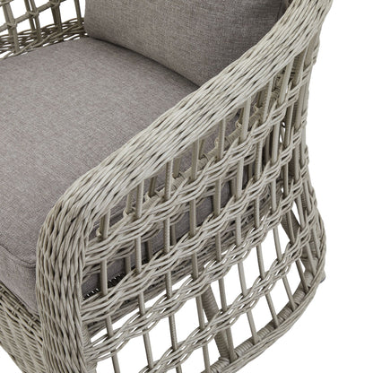 Wicker chair with gray cushions on a white background