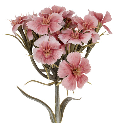 Artificial pink flowers on a white background