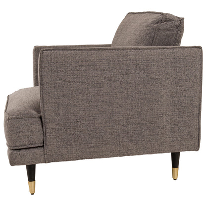 Gray upholstered armchair with gold feet on a white background