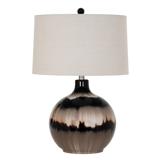 Table lamp with a black and brown ceramic base and a white lampshade on a white background
