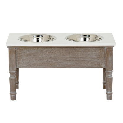 Wooden pet feeder with two stainless steel bowls on a white background