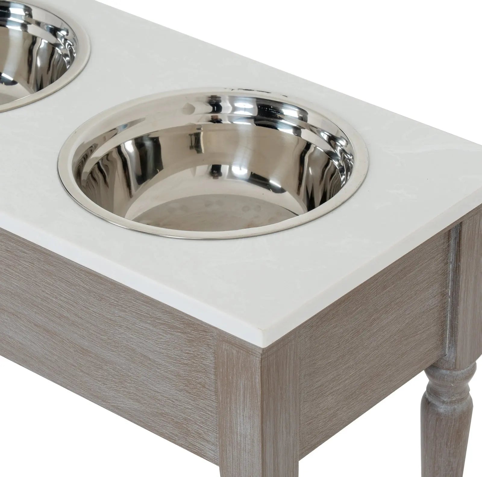 Wooden pet feeding station with two stainless steel bowls on a white background