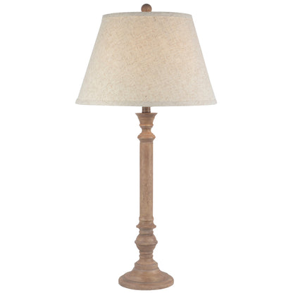Table lamp with beige shade and wooden base on a white background