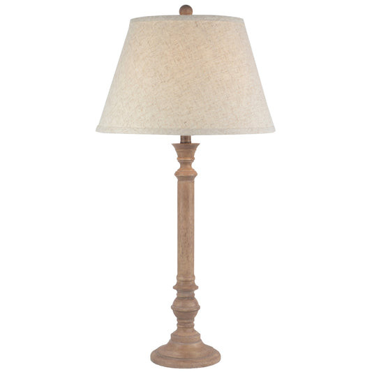 Table lamp with beige shade and wooden base on a white background