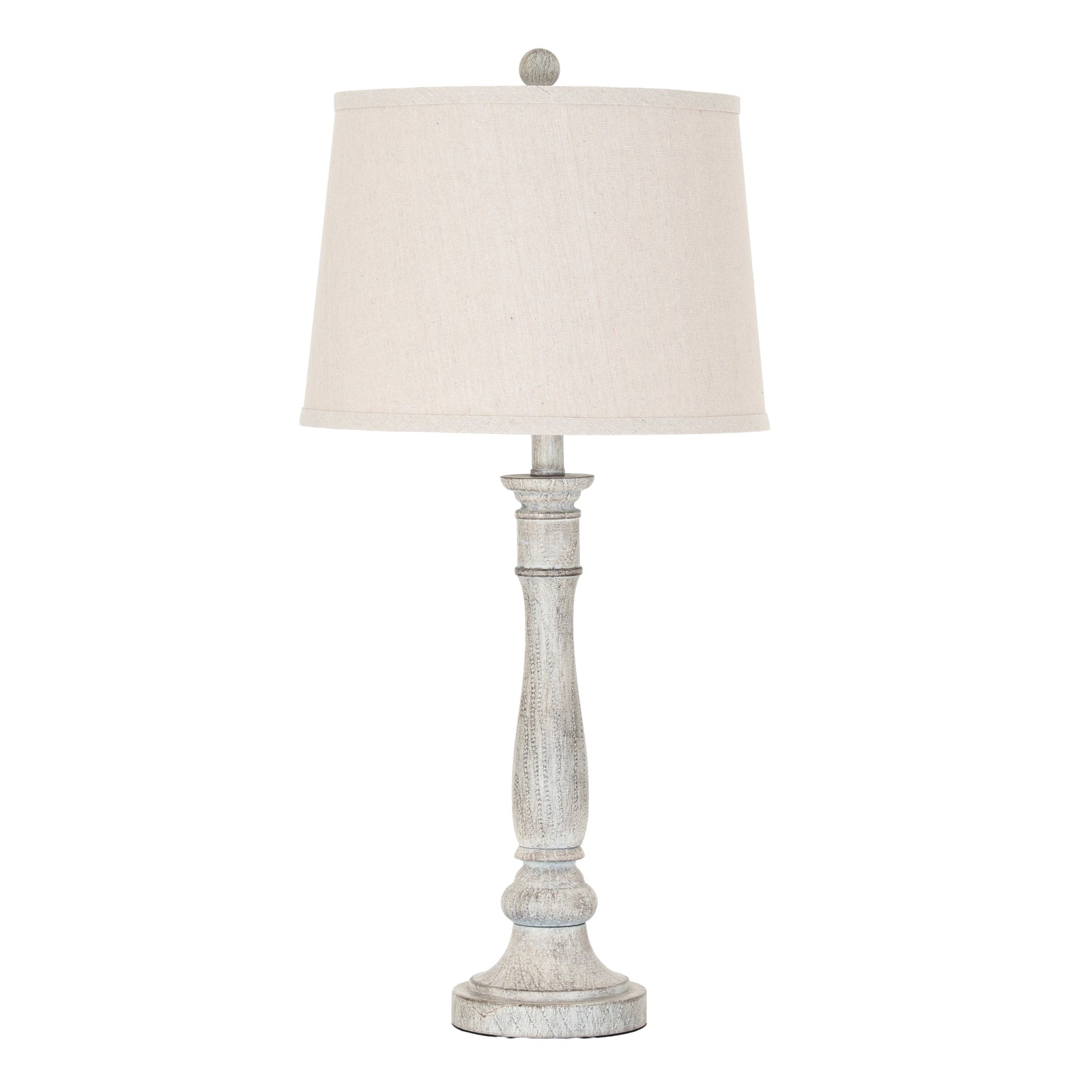 Table lamp with a white shade and wooden base on a white background