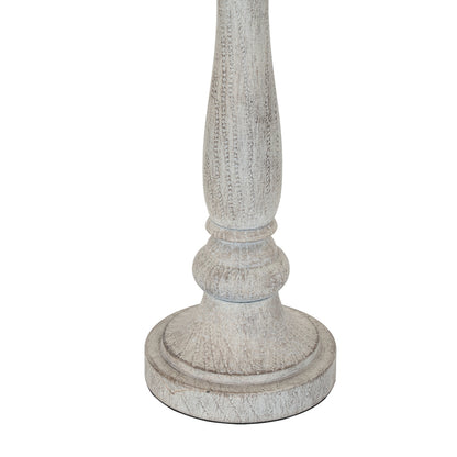 Decorative column with a textured surface on a white background