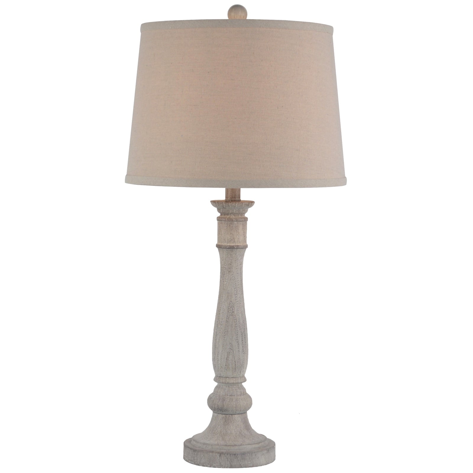 Table lamp with beige shade and wooden base on a white background
