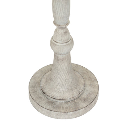 Decorative candle holder with a textured design on a white background