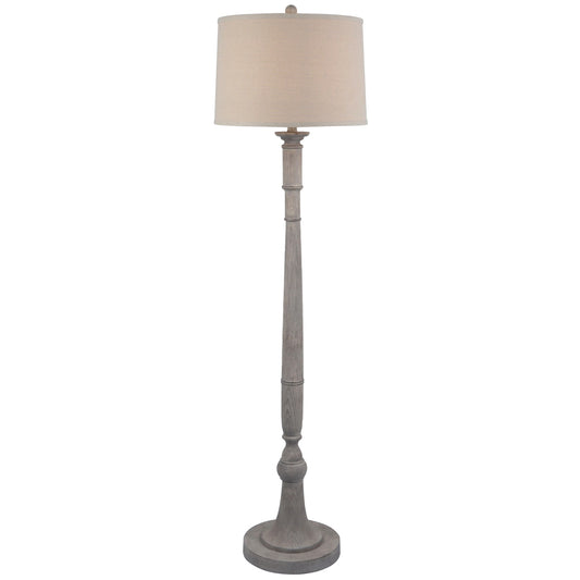 Floor lamp with a beige shade on a white background