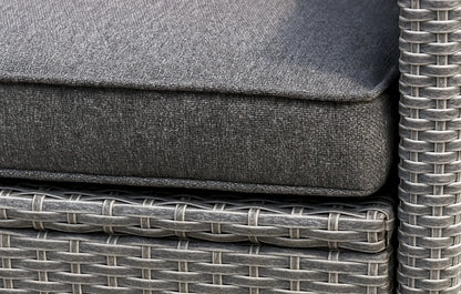 Gray cushions on a wicker outdoor furniture set