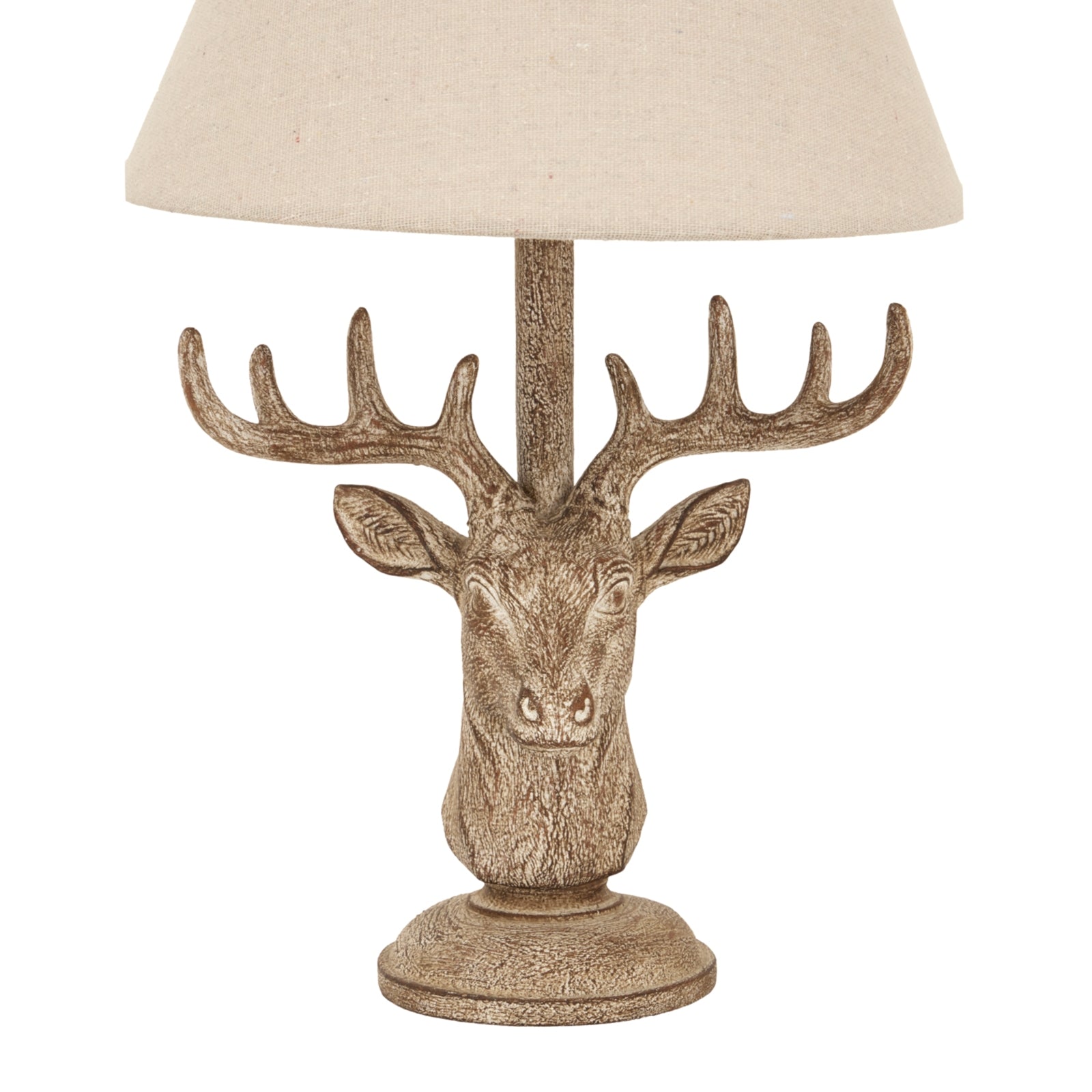 Decorative table lamp with a deer head design on a white background