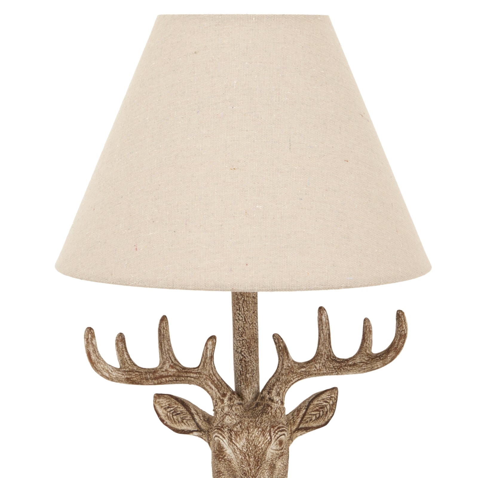 Decorative lamp with deer head design and beige lampshade on a white background