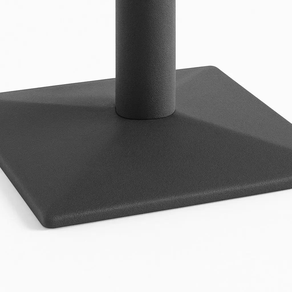 Close-up of a black square base with a cylindrical rod on a white background