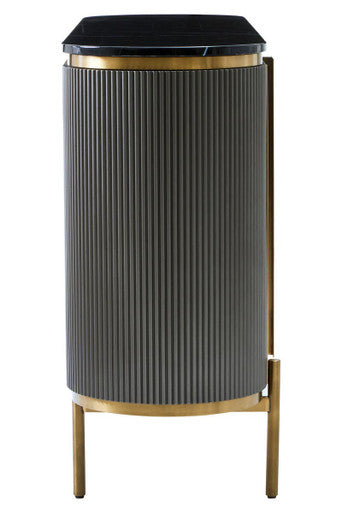 Tall cylindrical side table with ribbed design and gold accents on a white background