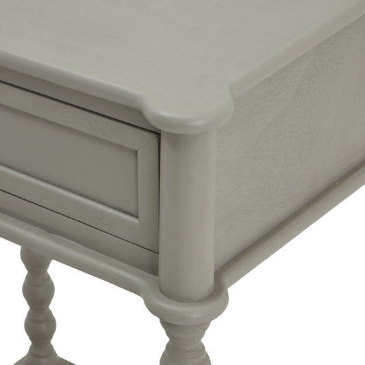 Close-up of a light gray wooden side table with a white background