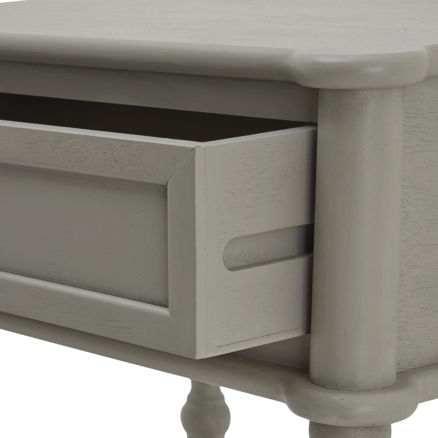 Close-up of a gray wooden drawer with a white background