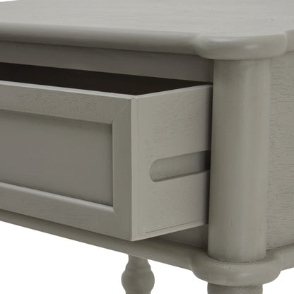 Close-up of a gray wooden drawer with a white background