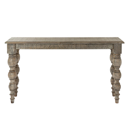 Wooden console table with turned legs on a white background