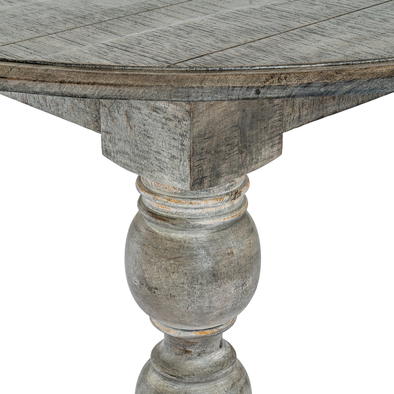 Round wooden table with a textured surface and decorative pedestal base on a white background