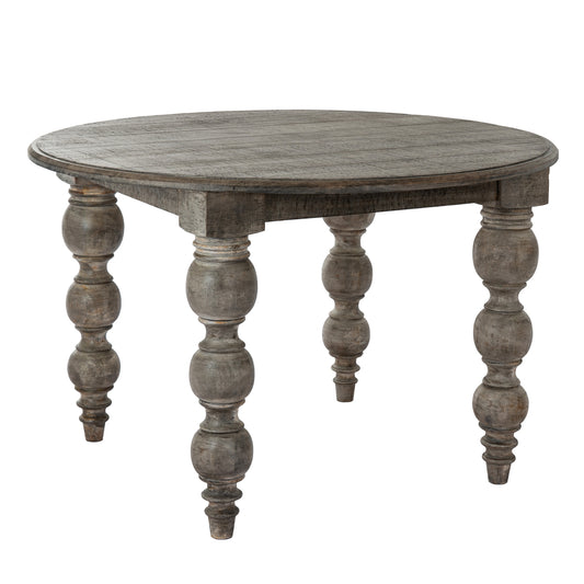 Round wooden table with turned legs on a white background