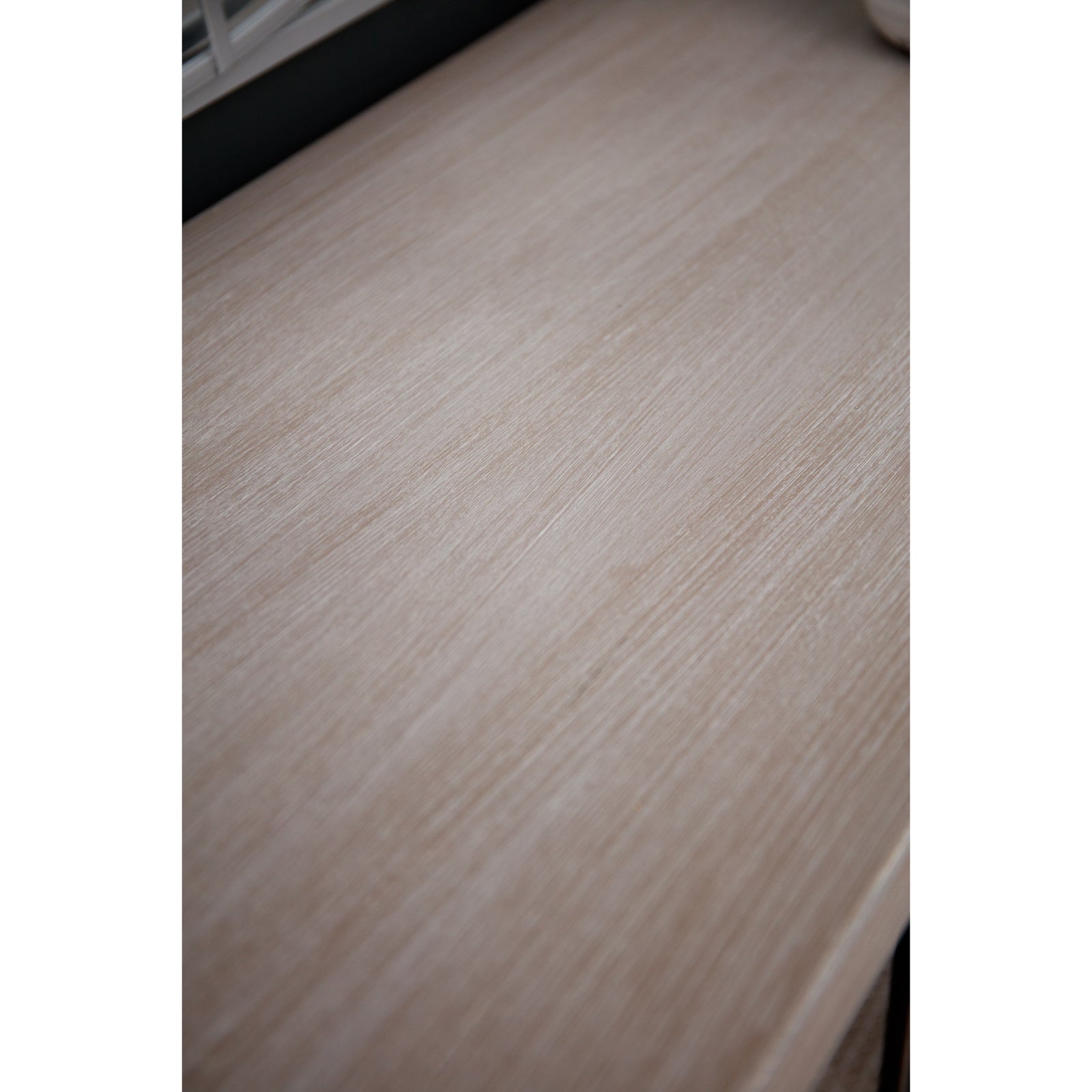 Close-up of a wooden surface with a light brown color.