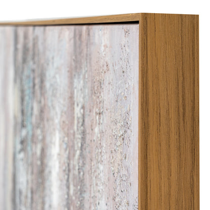 Close-up of a wooden frame with a textured panel