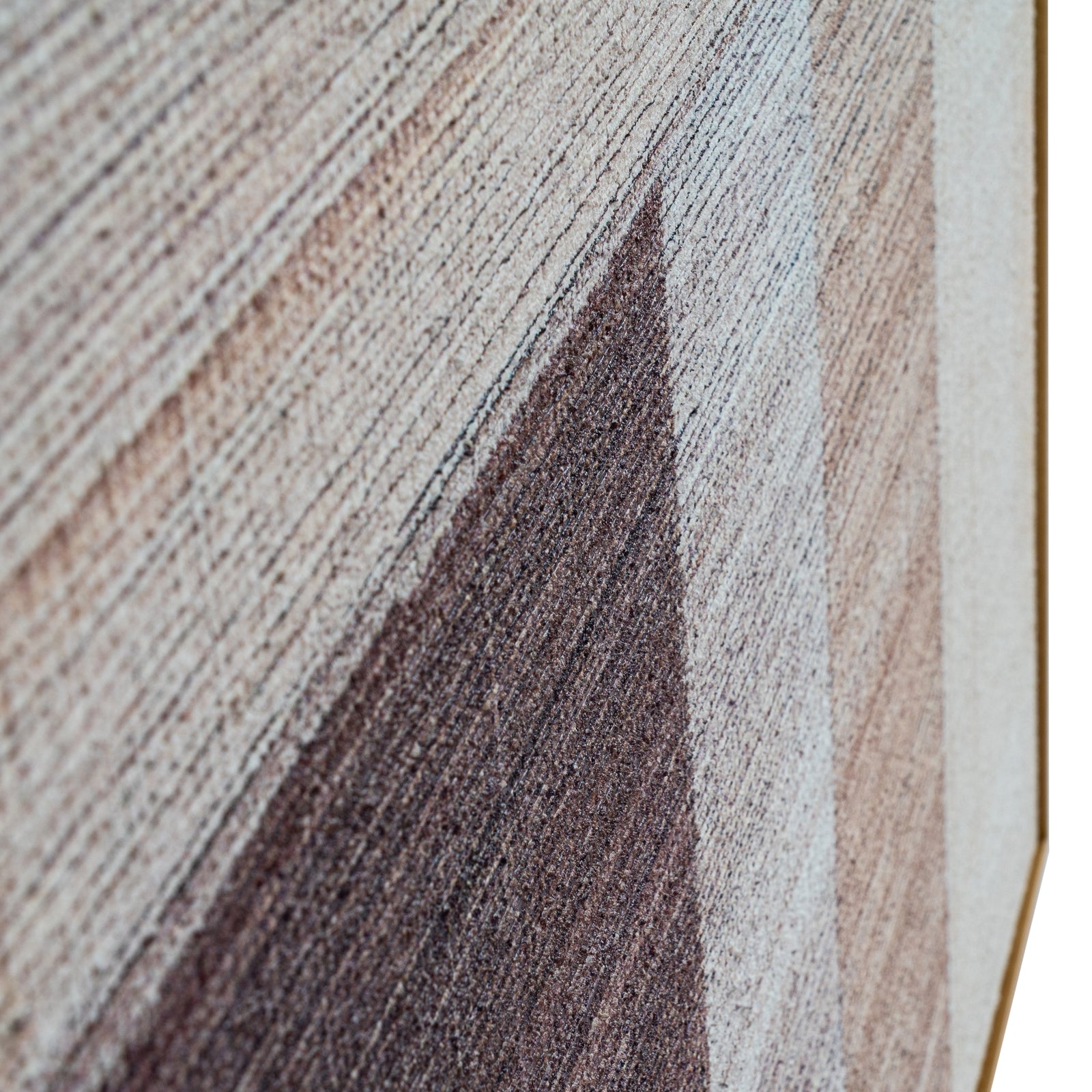 Close-up of a textured fabric with brown, beige, and gray color pattern