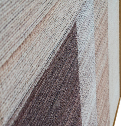 Close-up of a textured fabric with brown, beige, and gray color pattern