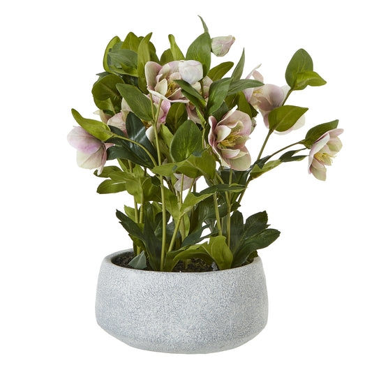 Artificial plant with pink flowers in a gray pot on a white background