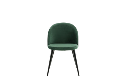 Green chair with black legs on a white background