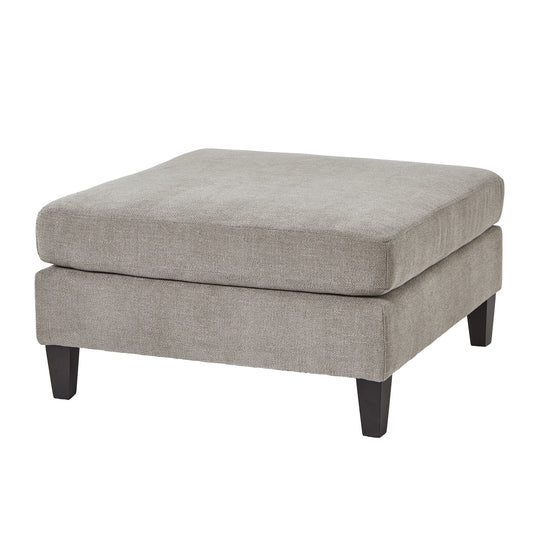 Gray ottoman with dark legs on a white background
