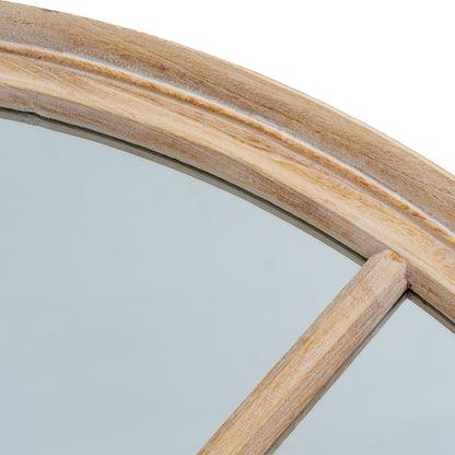 Round mirror with a wooden frame on a white background