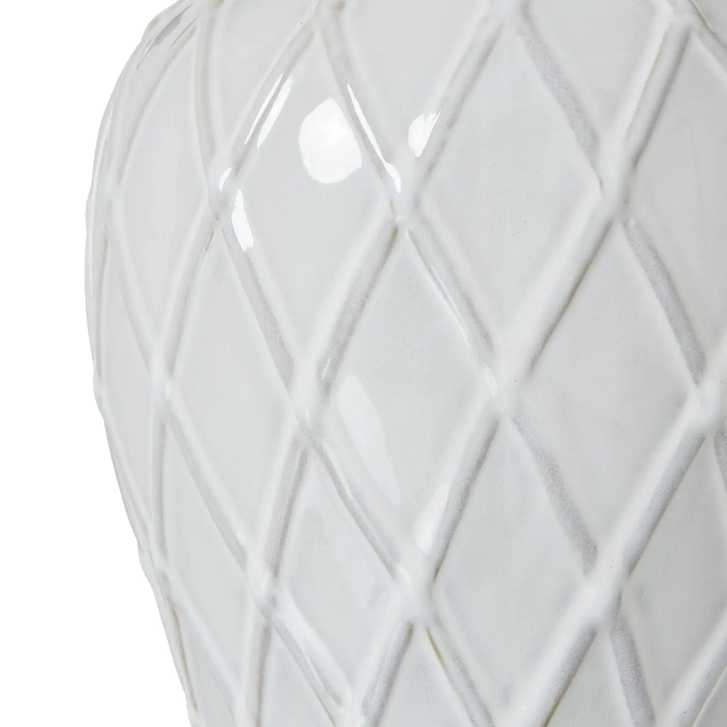 White ceramic vase with geometric lattice pattern on a white background