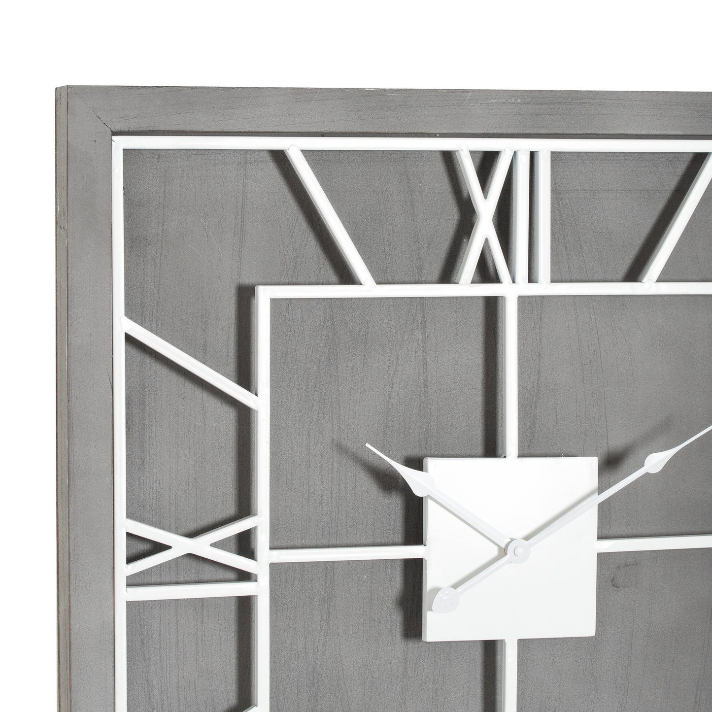 Modern wall clock with geometric design on a gray background
