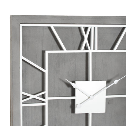 Modern wall clock with geometric design on a gray background
