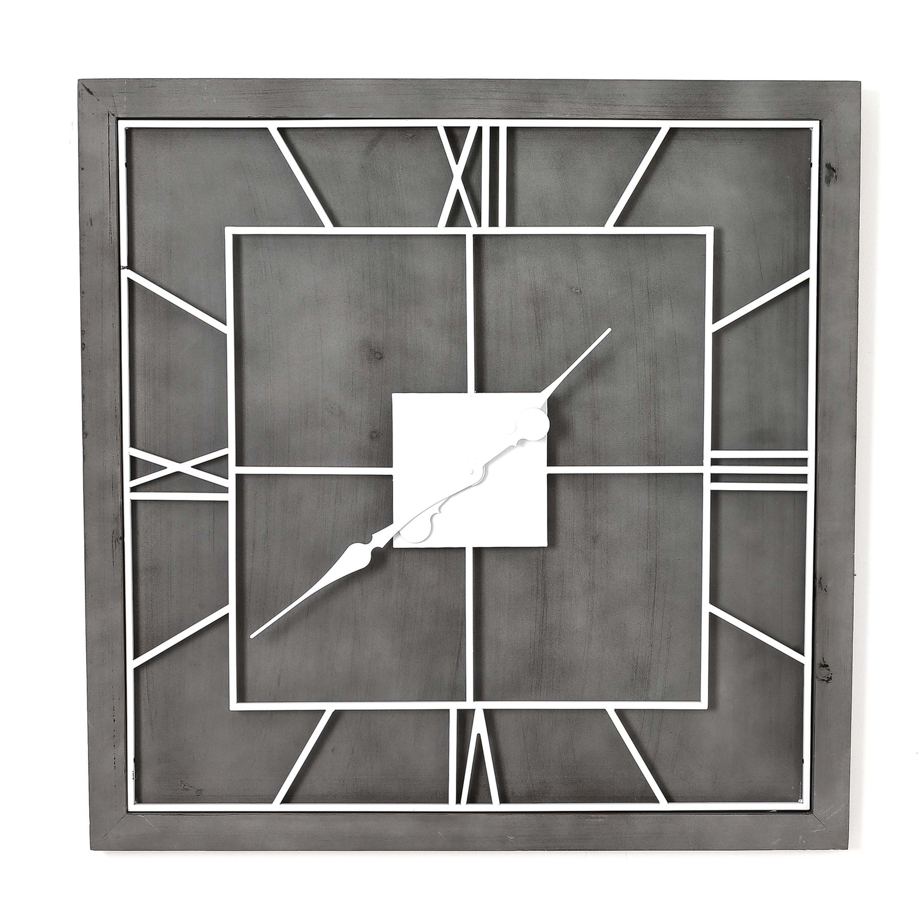 Decorative wall clock with geometric design on a white background