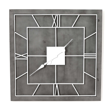 Decorative wall clock with geometric design on a white background