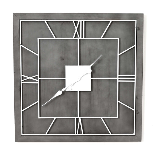 Decorative wall clock with geometric design on a white background