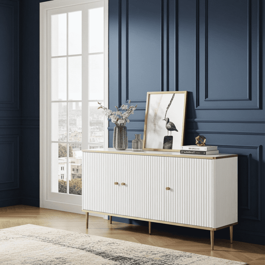 White sideboard with decorative items against a blue paneled wall.